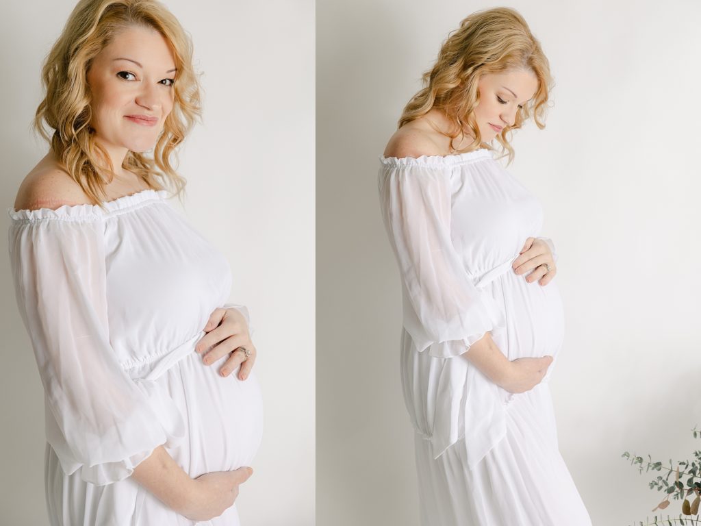 Indianapolis Intimate Maternity session in light and airy studio, mother holding baby bump while wearing white dress