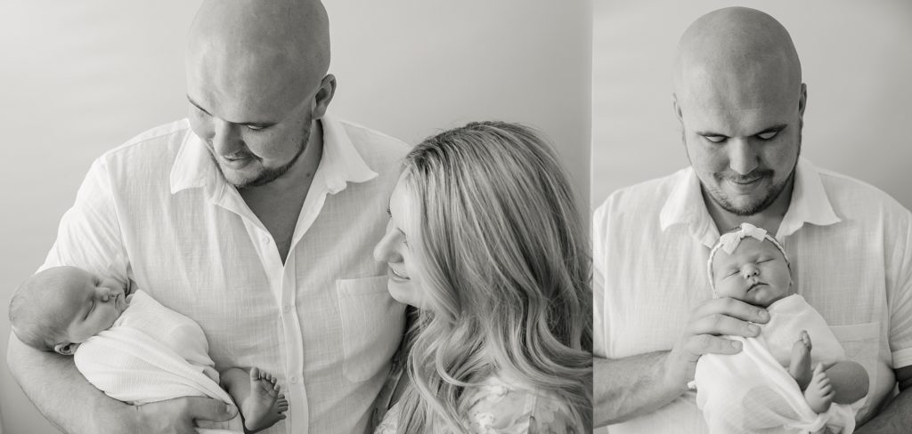 Indianapolis in home newborn session black and white images of new parents holding newborn baby girl