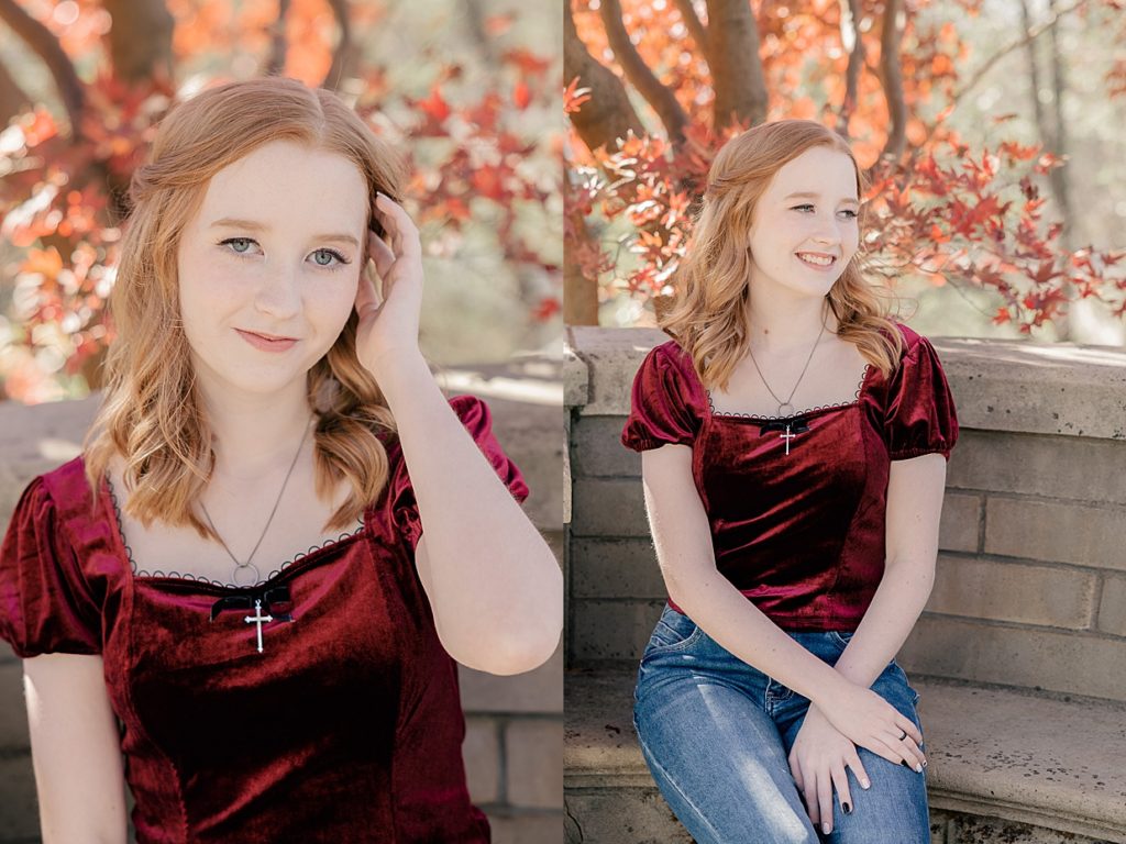 Newfields senior photography session with Indianapolis photographer Brittney Lear Photography, senior girl with red hair in a burgundy top with a Japanese maple tree behind her