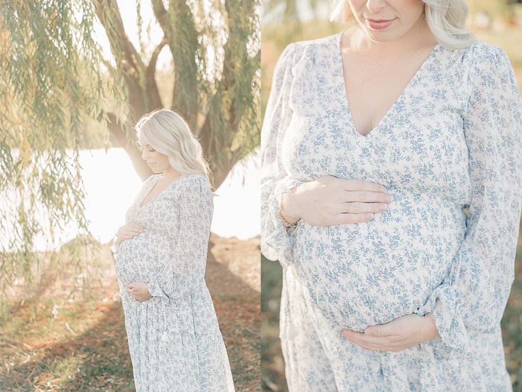 Images of a woman in a blue floral dress standing in front of a willow tree while holding her twin baby bump at 27 weeks pregnant during maternity session with Carmel maternity photographer, Brittney Lear Photography