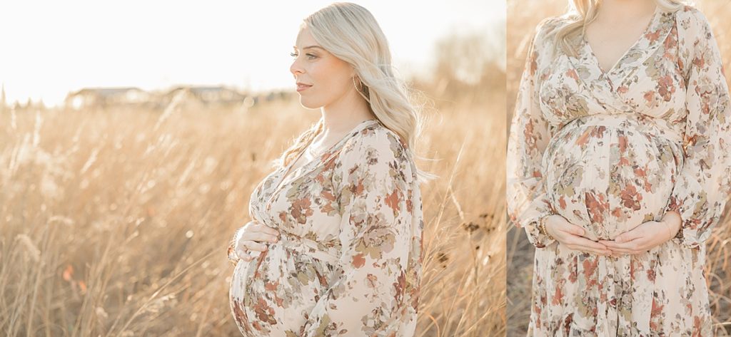 Images of a woman in a cream floral dress in a fall field while holding her twin baby bump at 27 weeks pregnant during maternity session with Indianapolis maternity photographer, Brittney Lear Photography