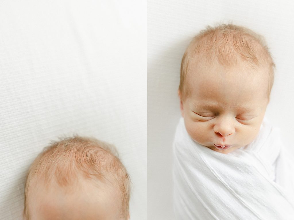 Newborn baby boy sleeping on a white blanket while wearing a white swaddle a close up of his hair Carmel newborn photographer